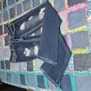 Distressed boot cut jeans